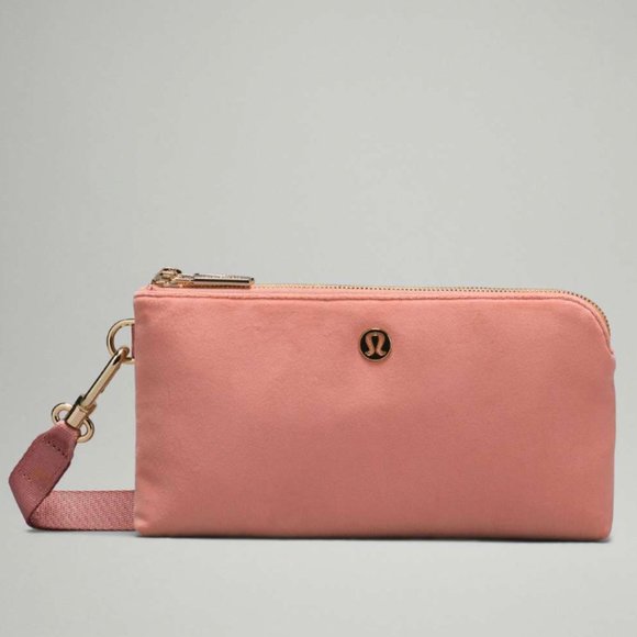 lululemon athletica Handbags - NWT Pink lululemon Curved Wristlet *Velour